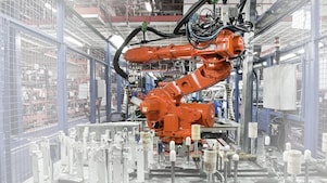 un bras robotisé rouge dans une usine