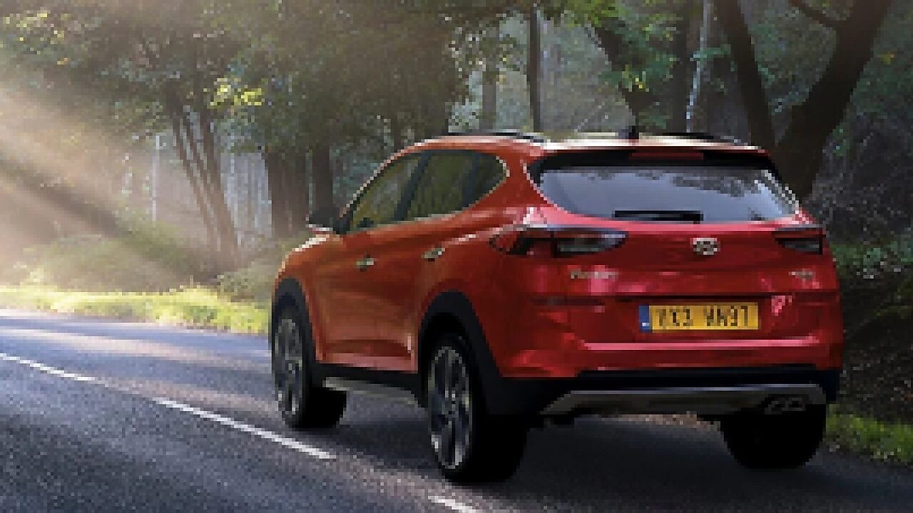 A red Maserati speeds uphill in the Shell Helix Ultra film We Know Why You Drive